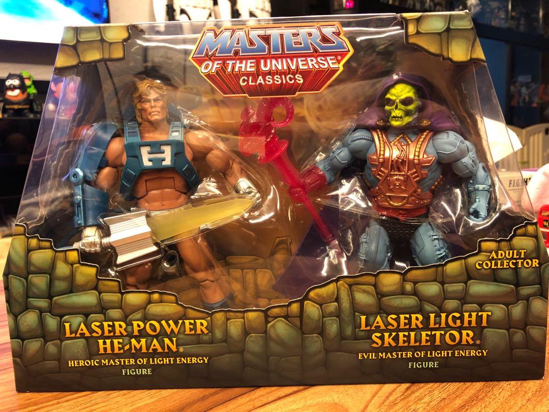 MOTU Masters of the Universe Classics Laser Power He-Man & Laser Light Skeletor 