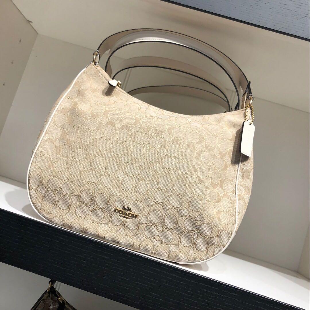Zip shoulder bag best sale in signature jacquard