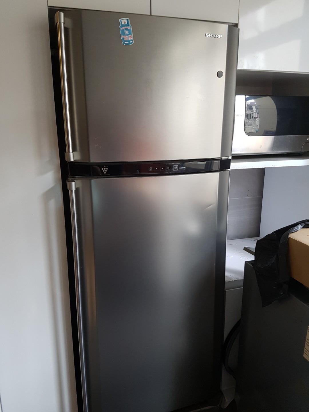 Sharp Refrigerator (Category: Refrigerators & Freezers) located in Singapore. Submitted by cherubs70 (Listing ID 204294468, Image 1). Description: In good condition.