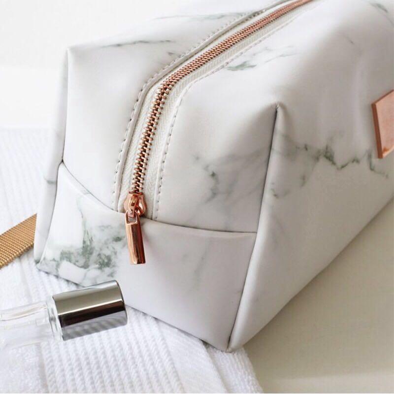 white and gold pencil case