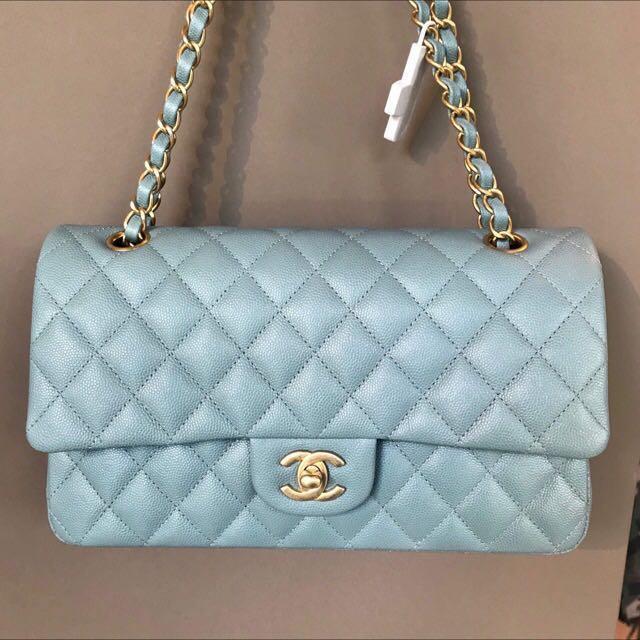 Chanel medium flap iridescent caviar light blue (frozen blue) gold  hardware, Luxury, Bags & Wallets on Carousell