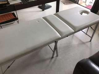 Massage table