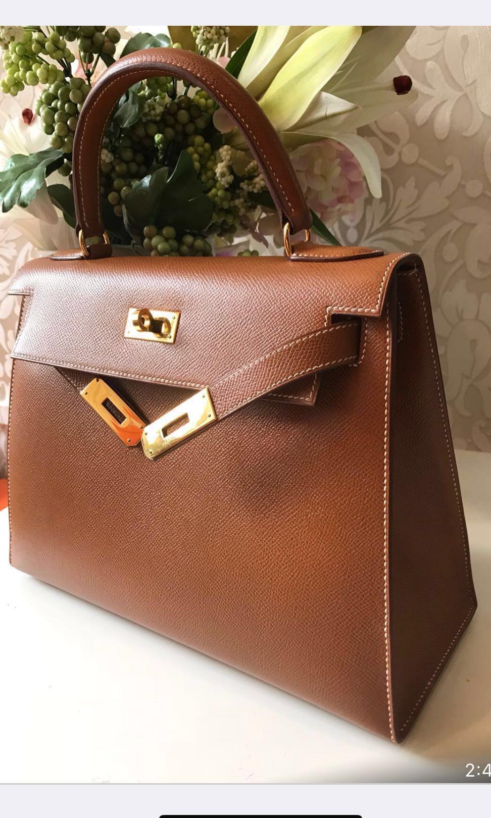 Hermes Kelly Bag Size 28 Epsom Leather in Gold Color with Silk Twilly Scarf  Petit H and Rodeo Bag Charm Stock Photo - Image of hermeslover, luxury:  113482908