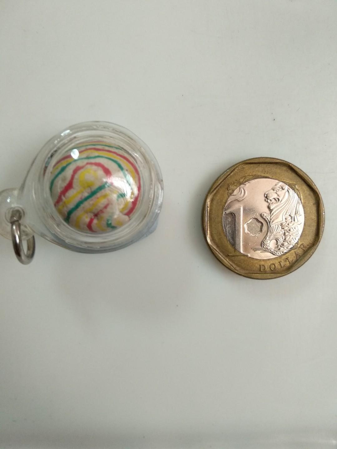 Loop om (Category: Religious Items) located in Singapore. Submitted by 88chokdee88 (Listing ID 204561285, Image 2). Description: Striped loop om with gold takrut. Forgot by what LP. Got it more than 10yrs back from dealer. Do your own research..