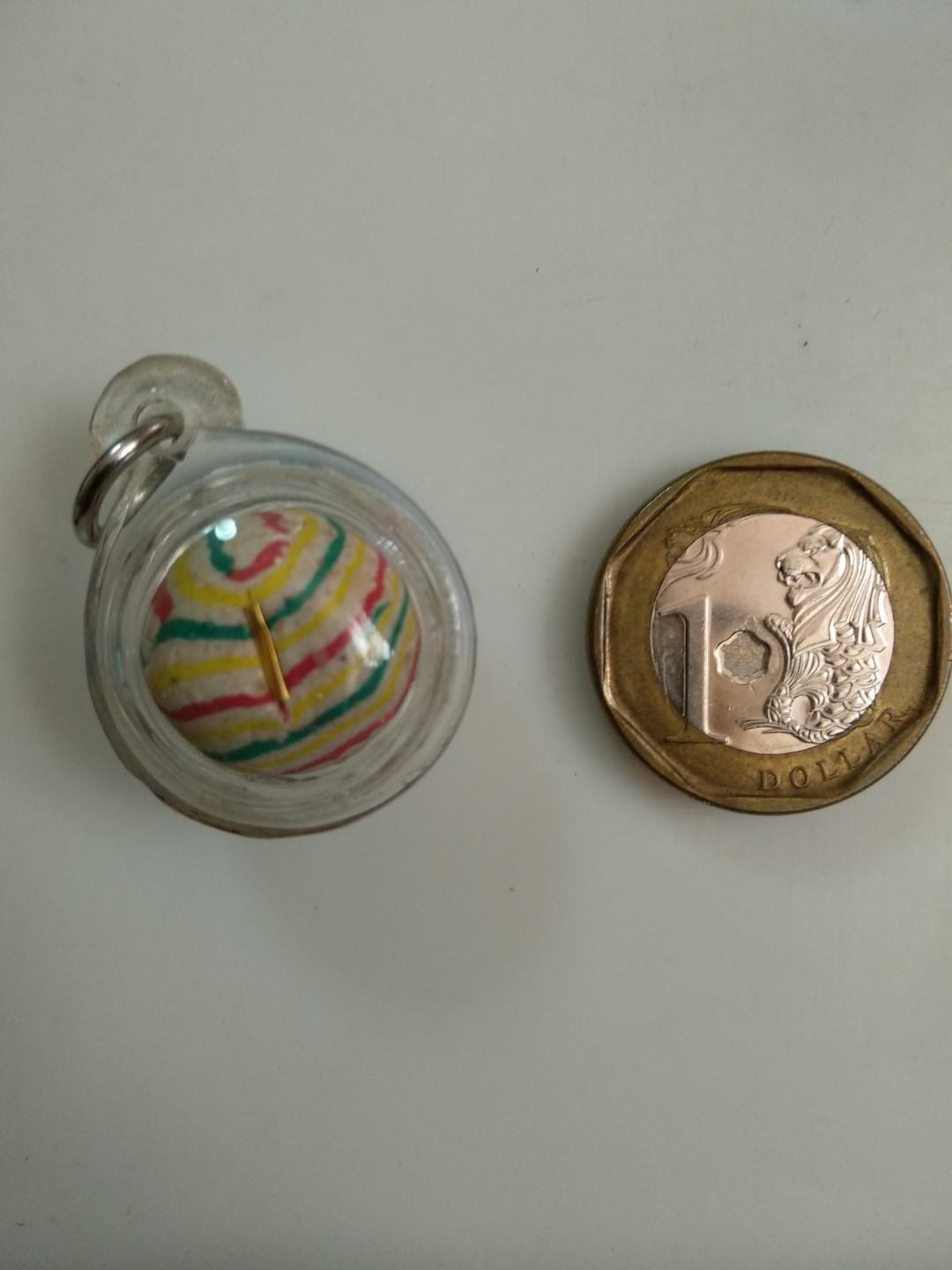Loop om (Category: Religious Items) located in Singapore. Submitted by 88chokdee88 (Listing ID 204561285, Image 1). Description: Striped loop om with gold takrut. Forgot by what LP. Got it more than 10yrs back from dealer. Do your own research..