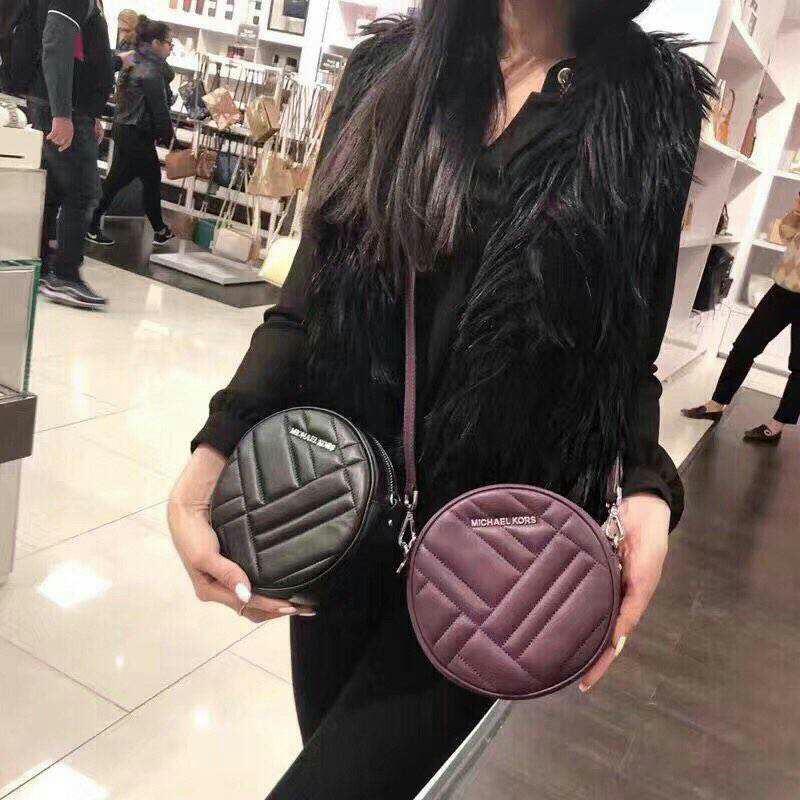 Michael Kors Round Sling Bag (100% Authentic), Women's Fashion, Bags &  Wallets, Cross-body Bags on Carousell