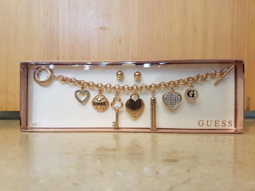 Guess charm bracelet and earring set online