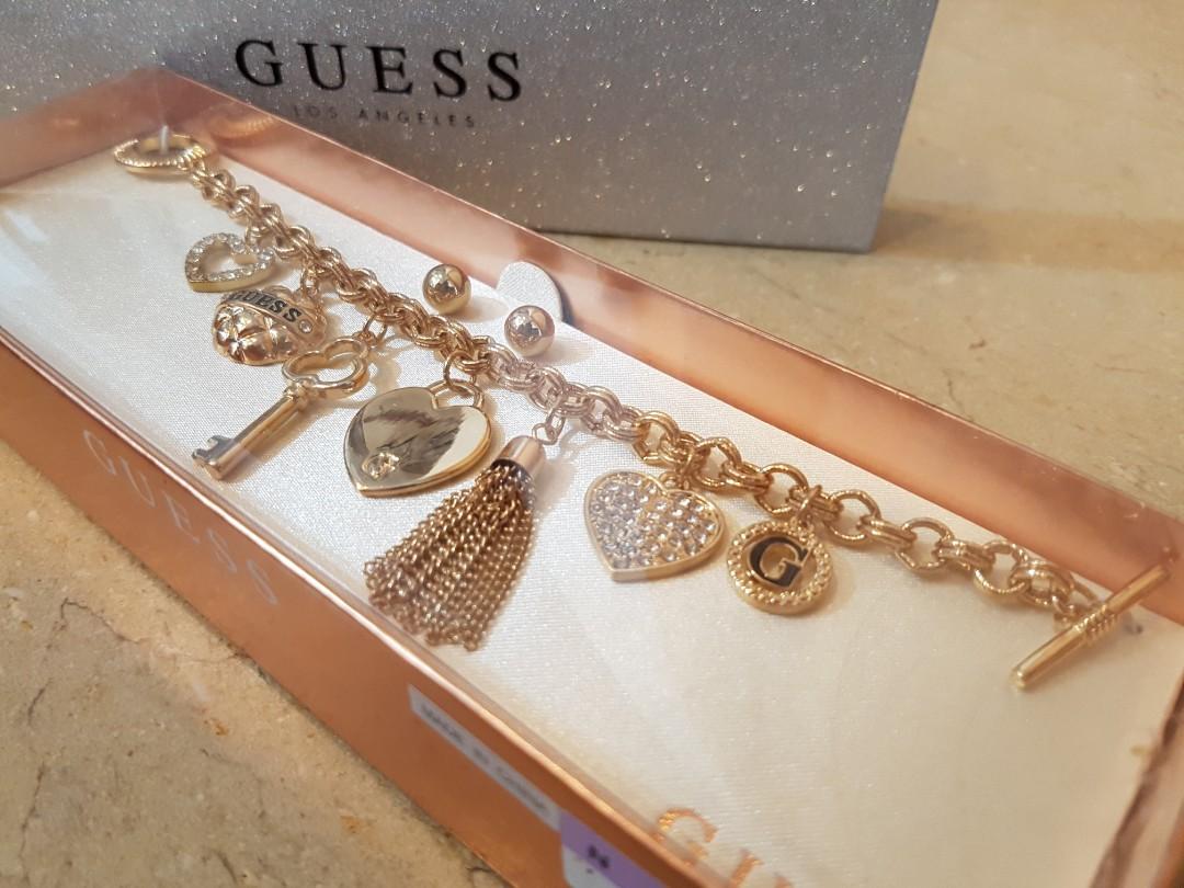 Guess charm bracelet and shop earring set