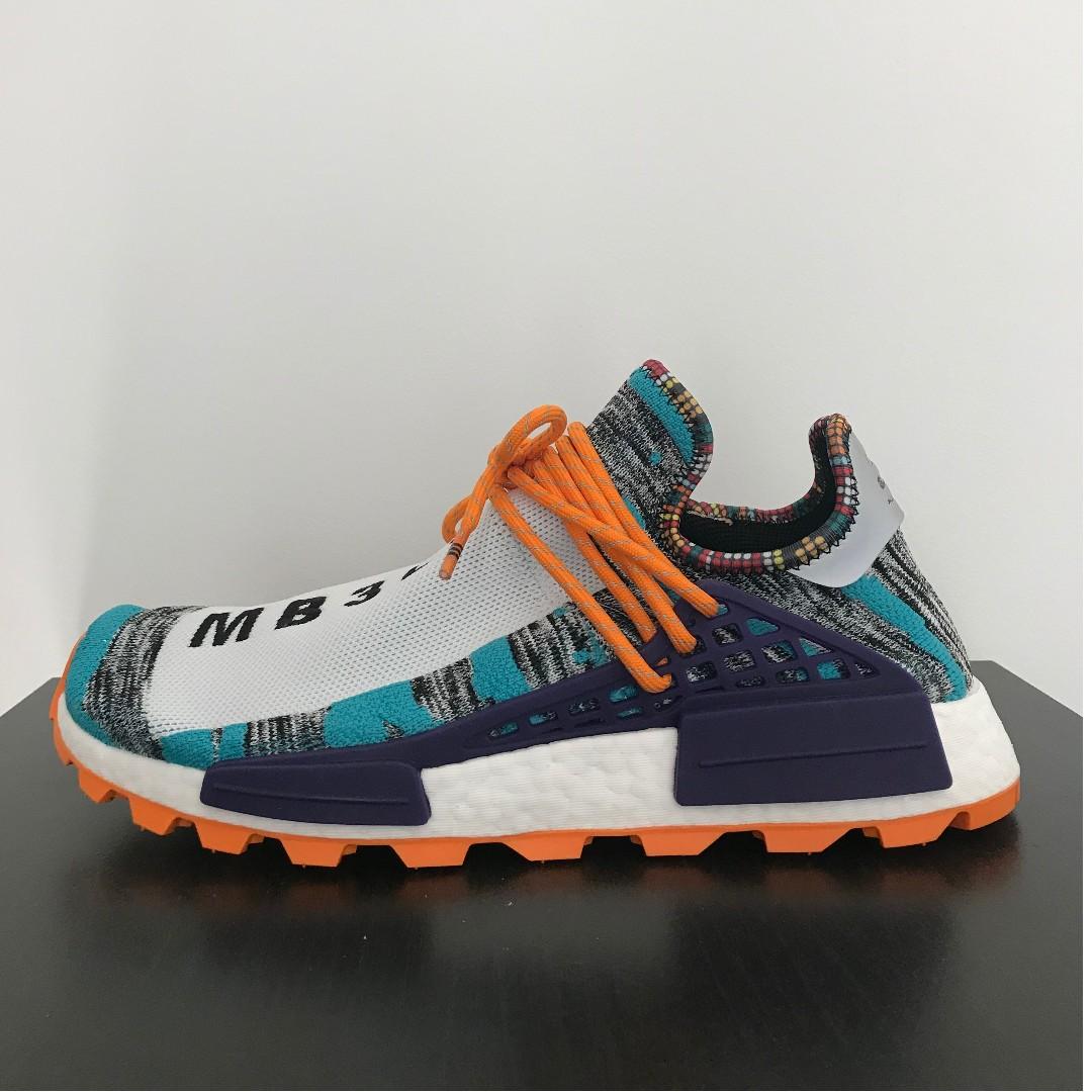 nmd hu pharrell solar pack orange