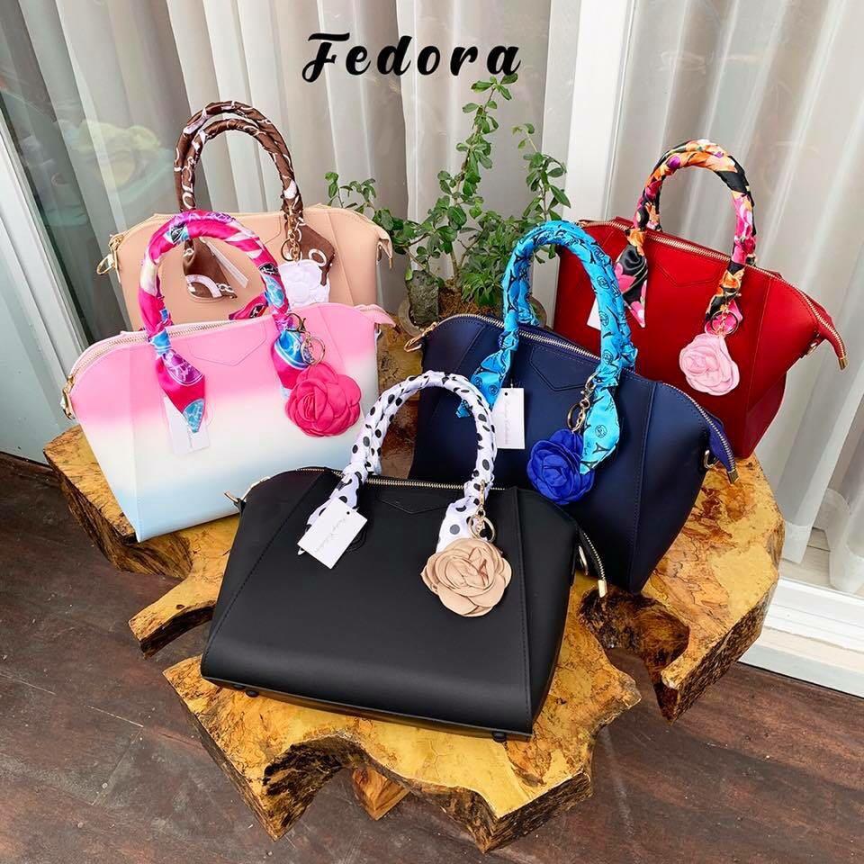 Fedora Bag (Category: Tote Bags) located in Quezon City. Submitted by everythingnewph (Listing ID 204960351, Image 1). Description: Inclusions: 2 twilly scarf 1 charm 1 sling strap 1 plain dust bag.