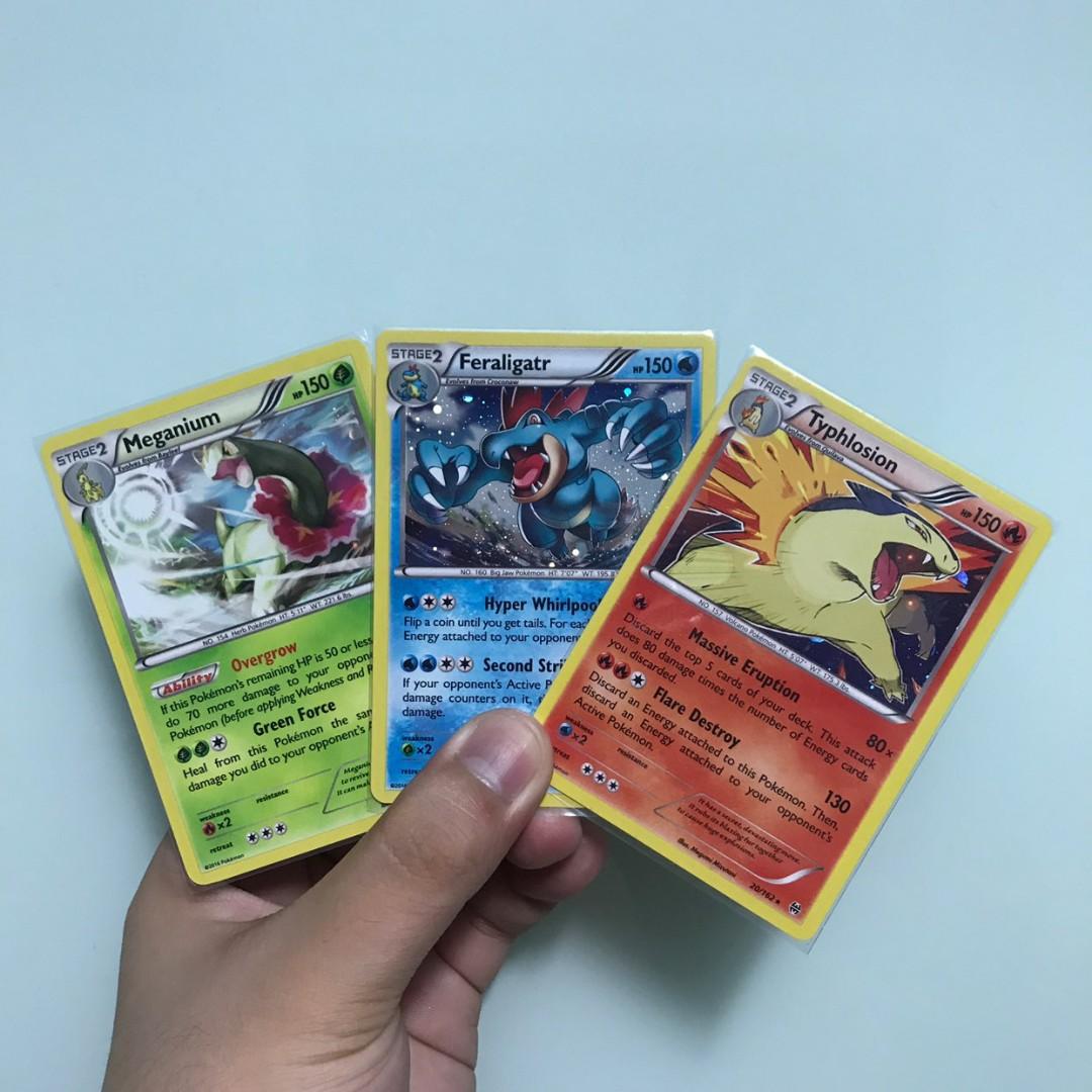 Meganium Typhlosion Feraligatr Johto Pokemon Promo Set Toys Games Board Games Cards On Carousell Typhlosion is a pokemon with a bulky, yet long and agile body. meganium typhlosion feraligatr johto pokemon promo set