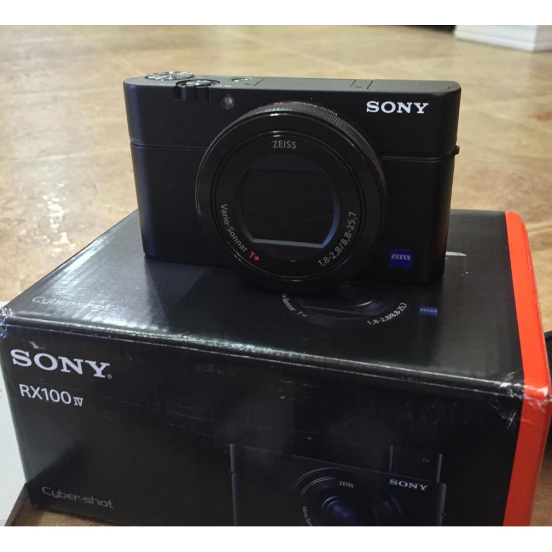 Sony Rx100 Iv Advanced Camera With 1 0 Type Bsi Sensor Additional Battery And Travel Charger Photography Cameras Mirrorless On Carousell