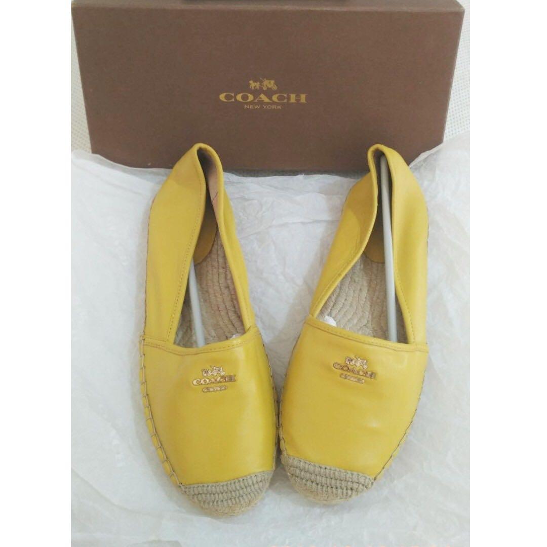 yellow coach shoes