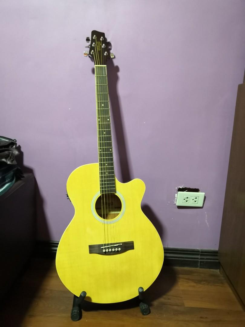 STAGG ACOUSTIC GUITAR (Category: Musical Instruments) located in Santa Rosa. Submitted by elline0901 (Listing ID 205469903, Image 1). Description: Rfs: no one is using it. In good condition. Guitar has built in tuner Bought for 12k. Inclusive of guitar bag, capo, and amplifier..
