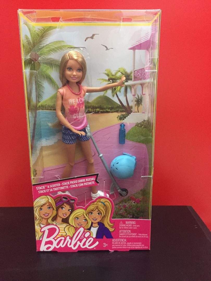 Barbie stacie doll and scooter top