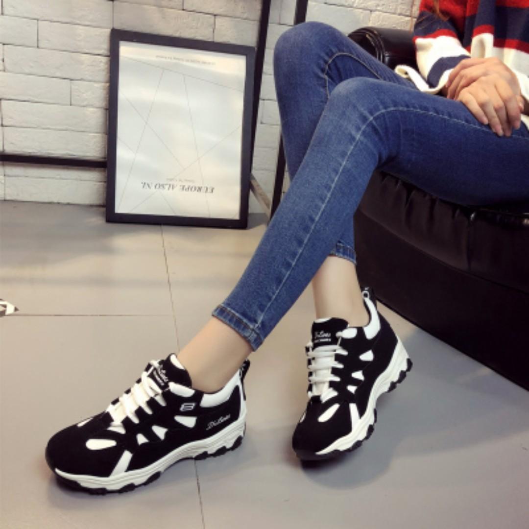 black and white rubber shoes
