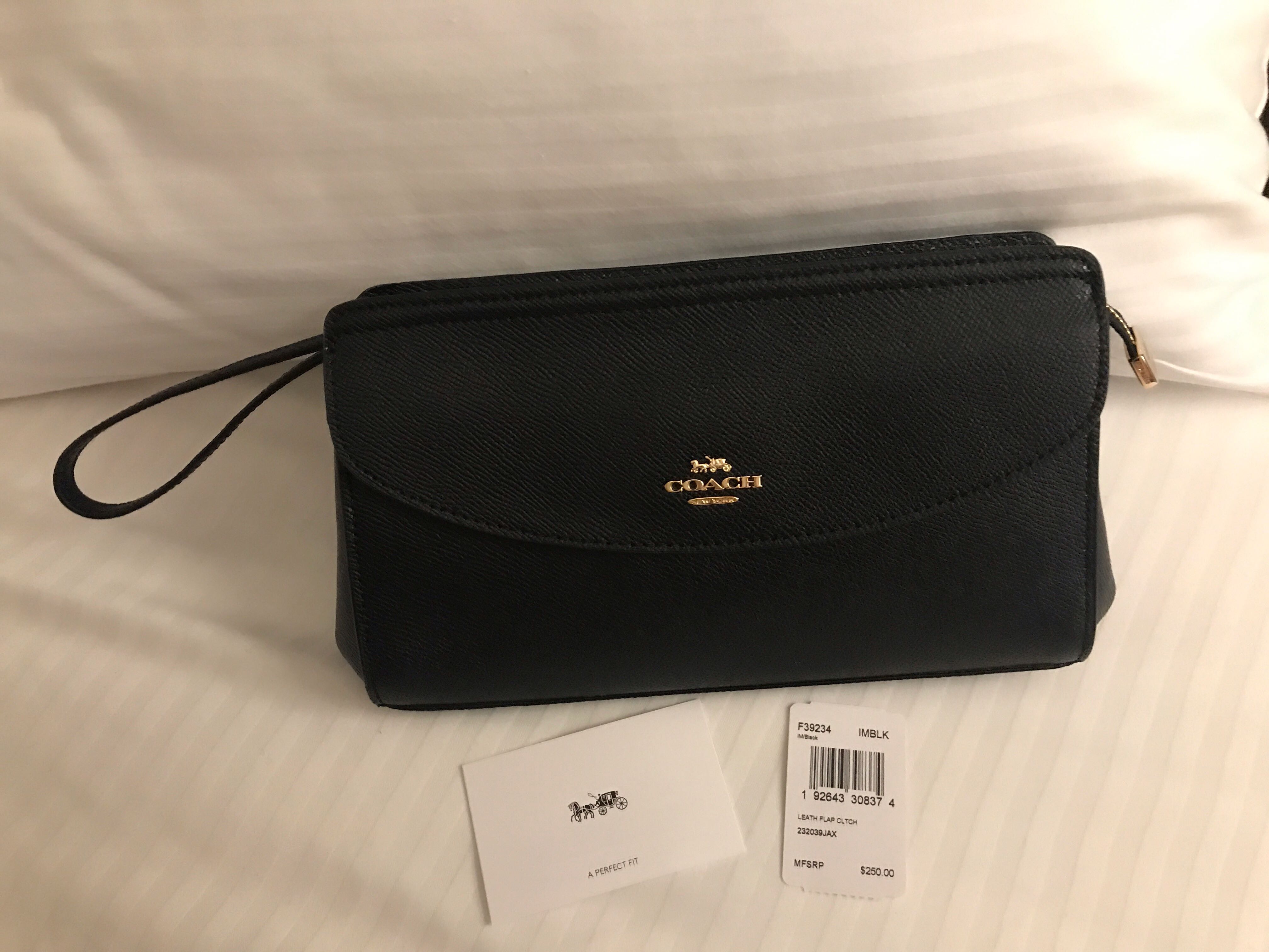 Coach black clutch clearance