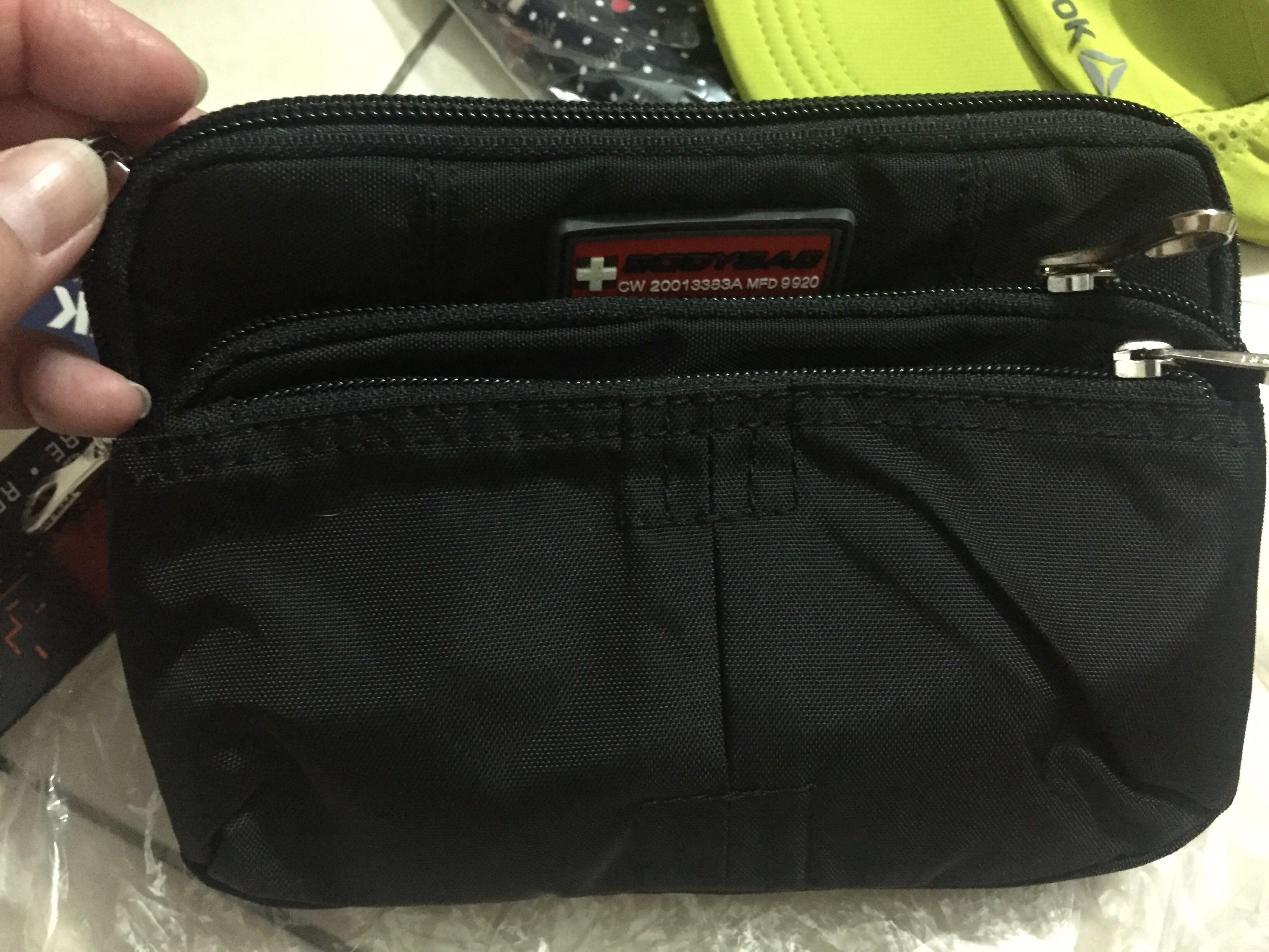 cross logo brand bag