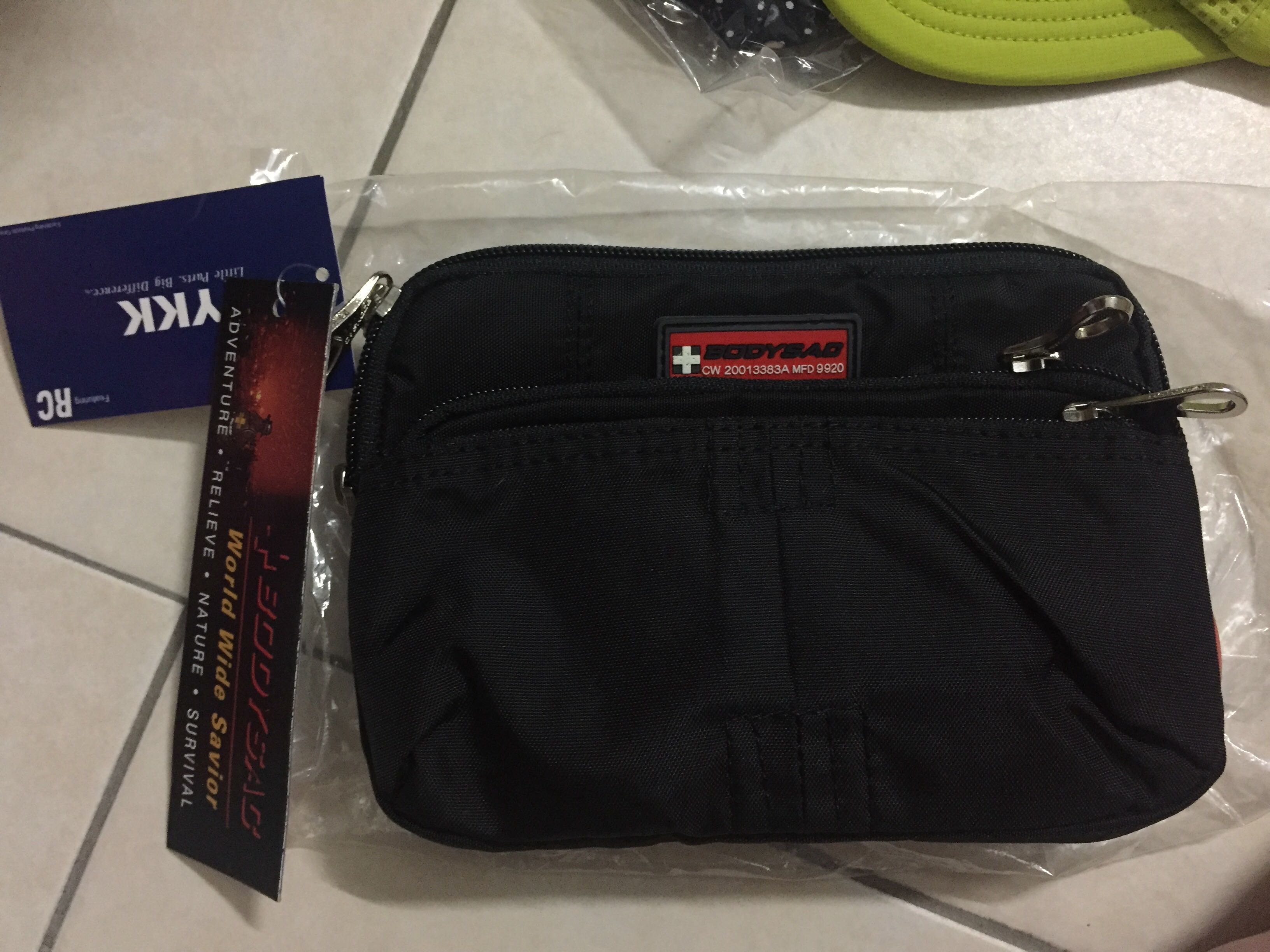 cross logo brand bag