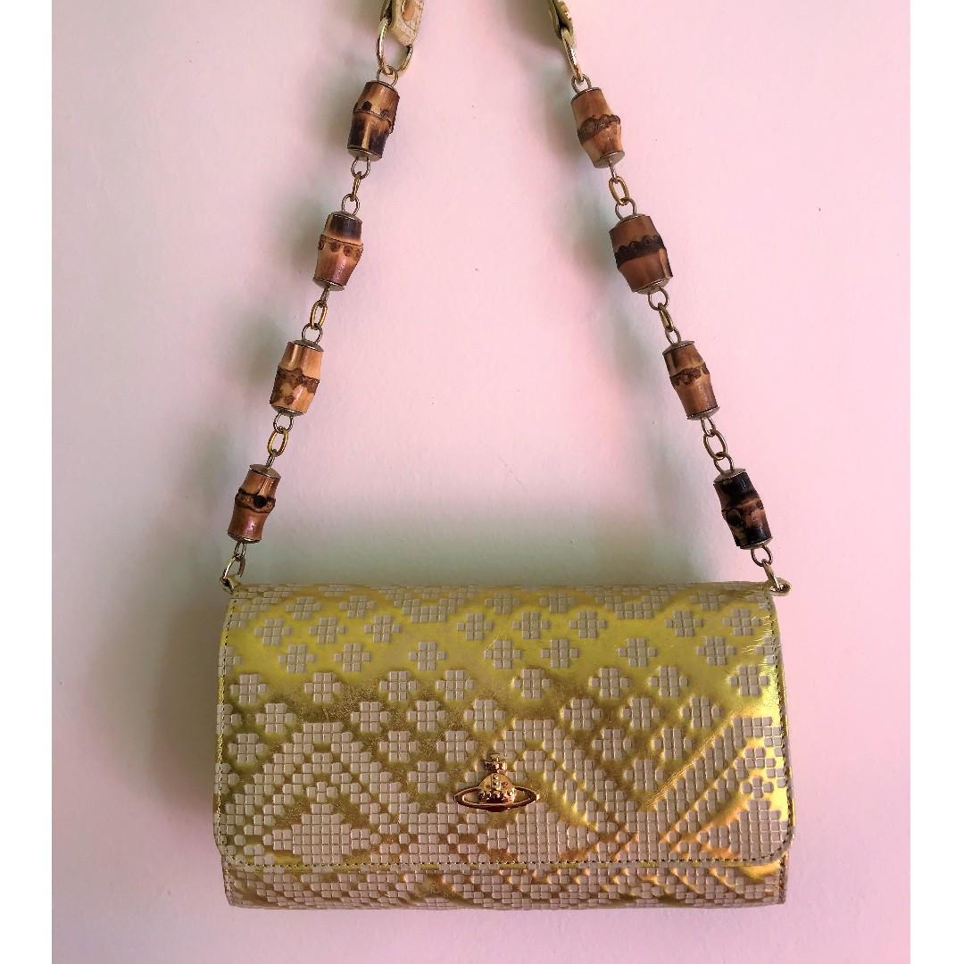 Gold vivienne new arrivals westwood clutch