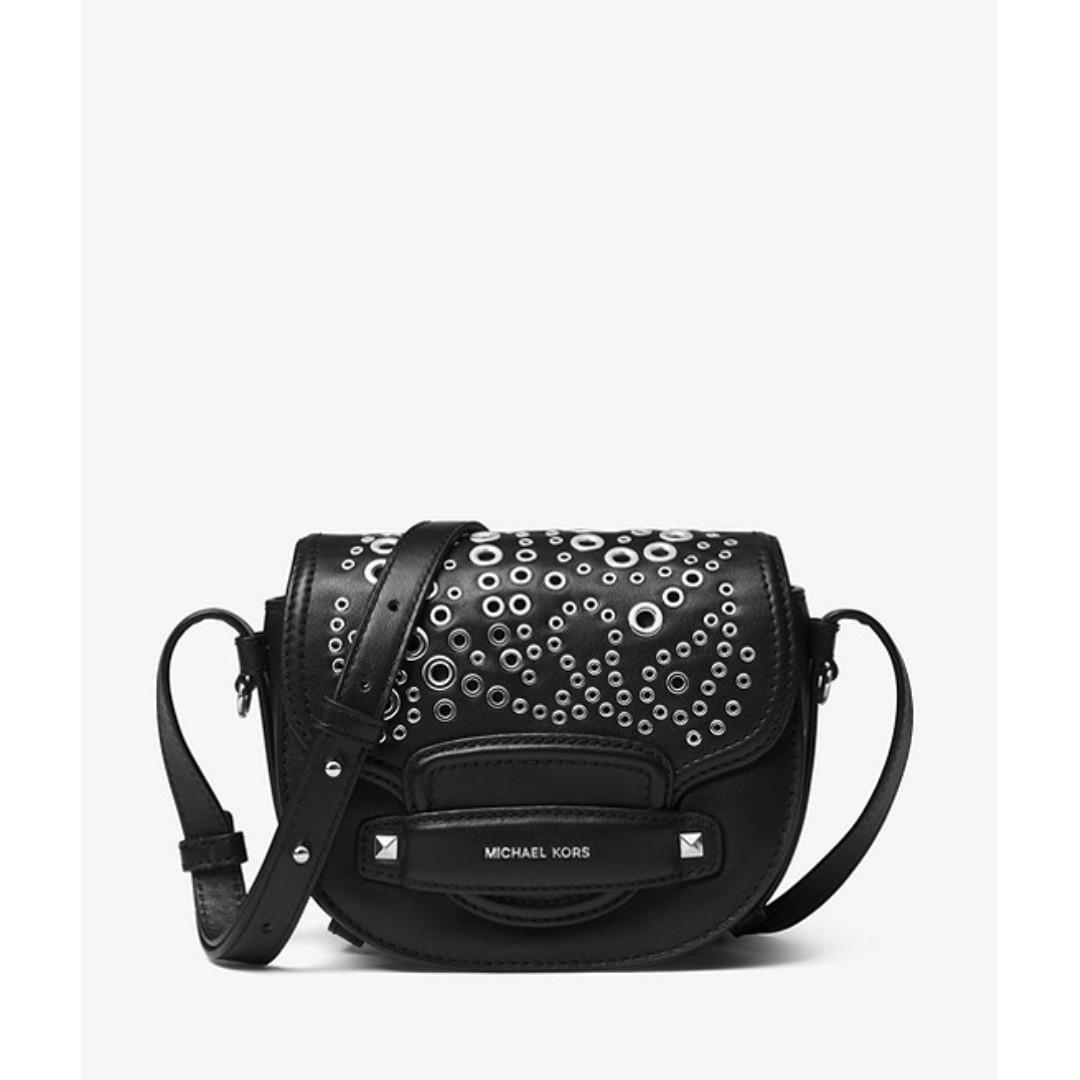 michael kors cary medium grommeted leather saddle bag
