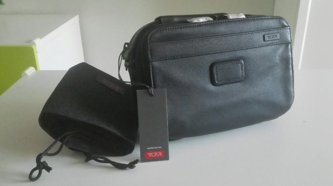 tumi alpha 2 clutch