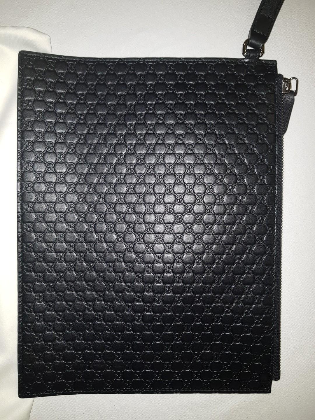 Gucci embossed clutch sales