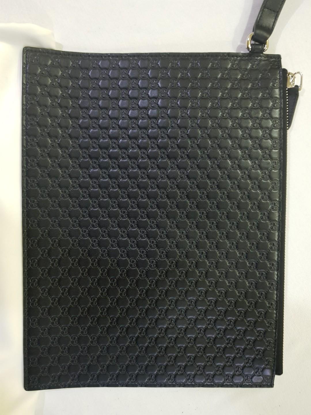 Gucci embossed clutch new arrivals