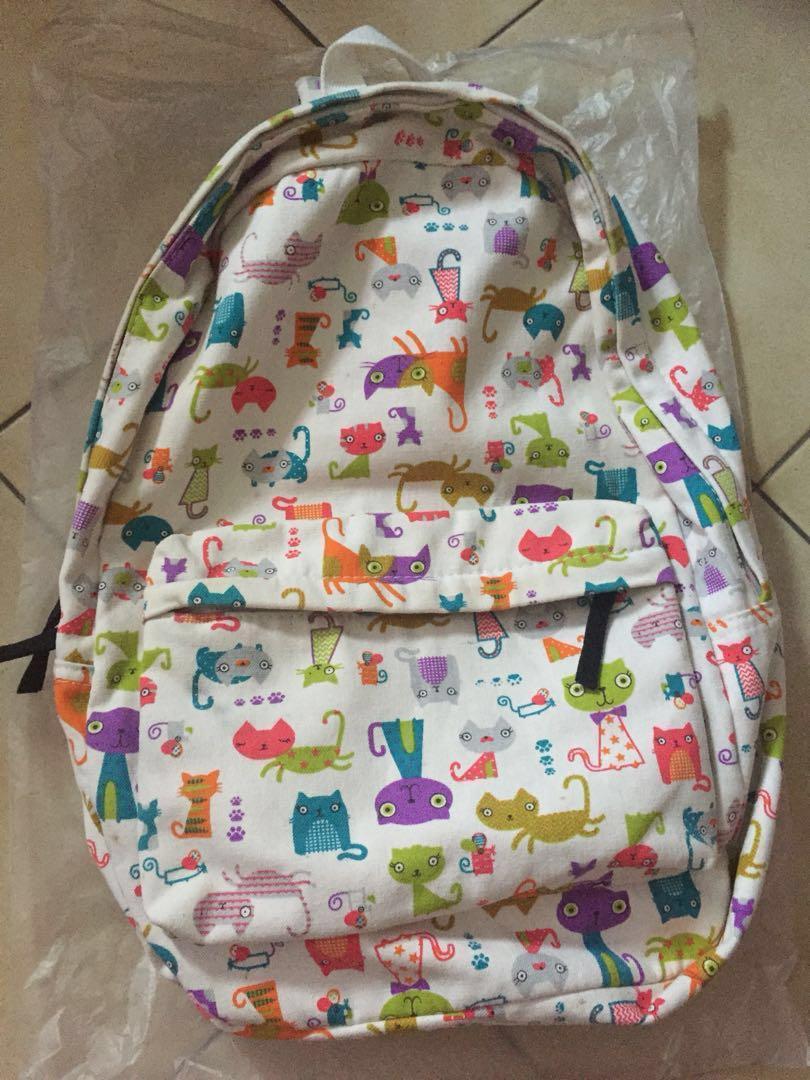 Kitten designed backpack (Category: Backpacks) located in Singapore. Submitted by happy_seller8 (Listing ID 201104580, Image 1). Description: Zips and compartments are perfectly fine. Seldom use backpack so selling it. See photos for the bag conditions. Condition is 9/10. Fixed price and venue. Suitable for kitten lovers :) Self Collection only. .