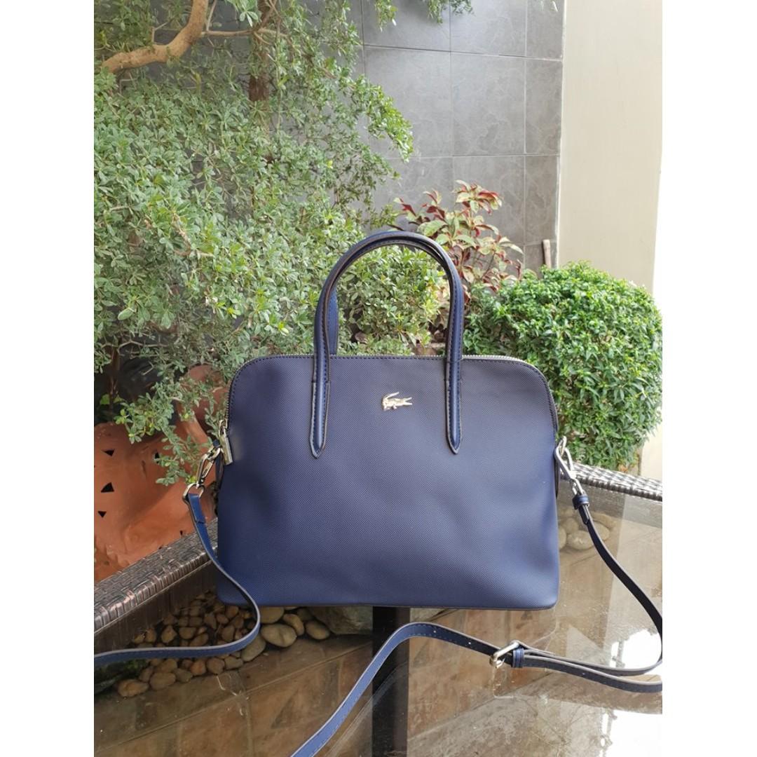 loft Egern announcer Lacoste Women's Chantaco Dual Carry Piqué Leather Bugatti Bag - Navy Blue,  Women's Fashion, Bags & Wallets, Cross-body Bags on Carousell