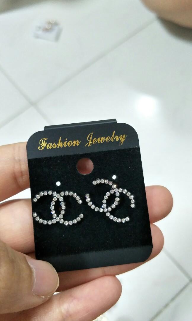 Chanel brand name earring black base
