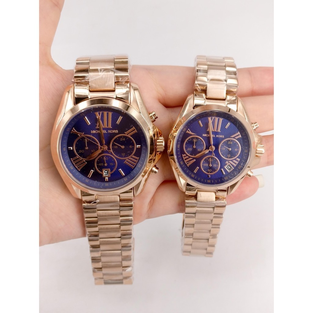 mk gold watch with blue face