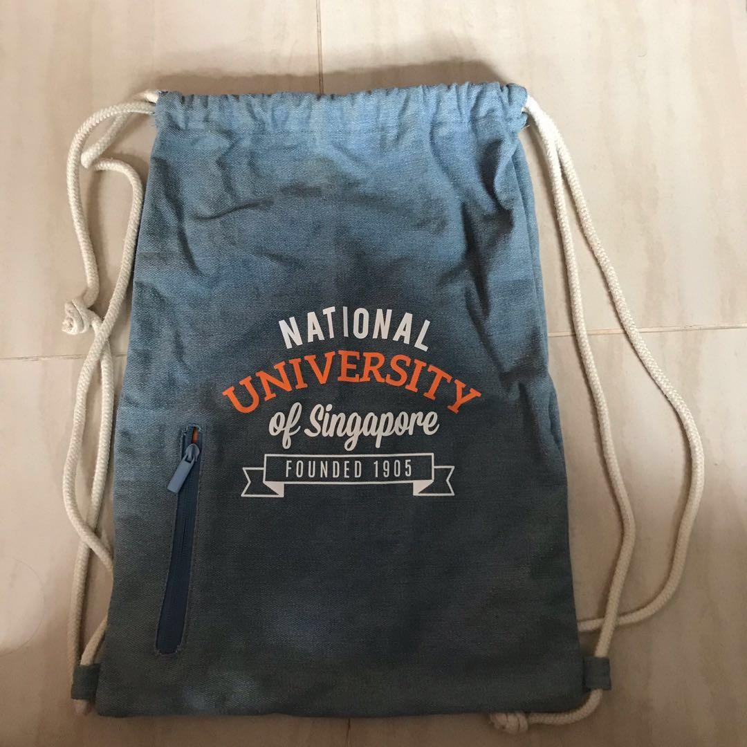 Drawstring Bag (Category: Sling Bags) located in Singapore. Submitted by fastandcheap (Listing ID 206614463, Image 2). Description: All brand new non-nego 1. NUS blue 2. NUS grey 3. Kent ridge alumni family day SLING BAG Self collection only.