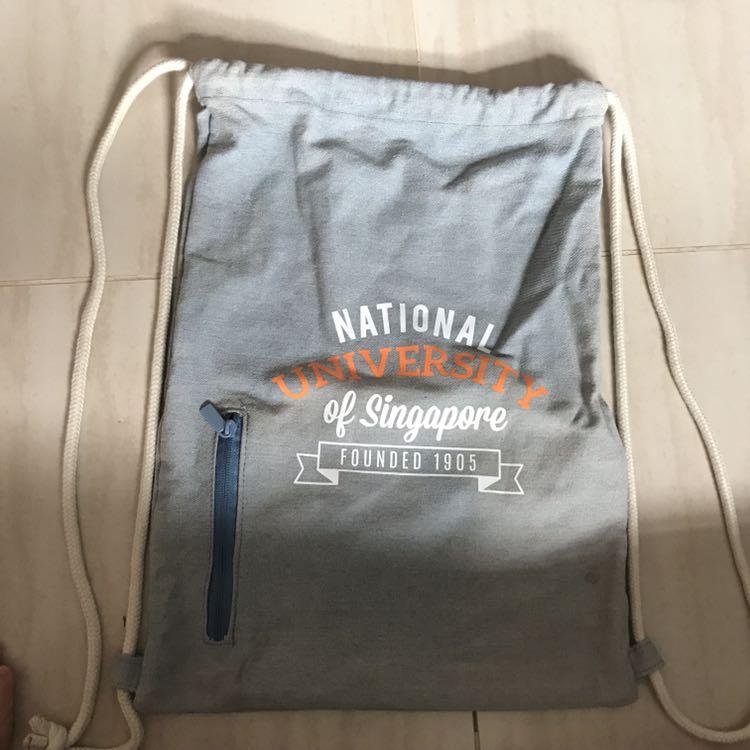 Drawstring Bag (Category: Sling Bags) located in Singapore. Submitted by fastandcheap (Listing ID 206614463, Image 3). Description: All brand new non-nego 1. NUS blue 2. NUS grey 3. Kent ridge alumni family day SLING BAG Self collection only.
