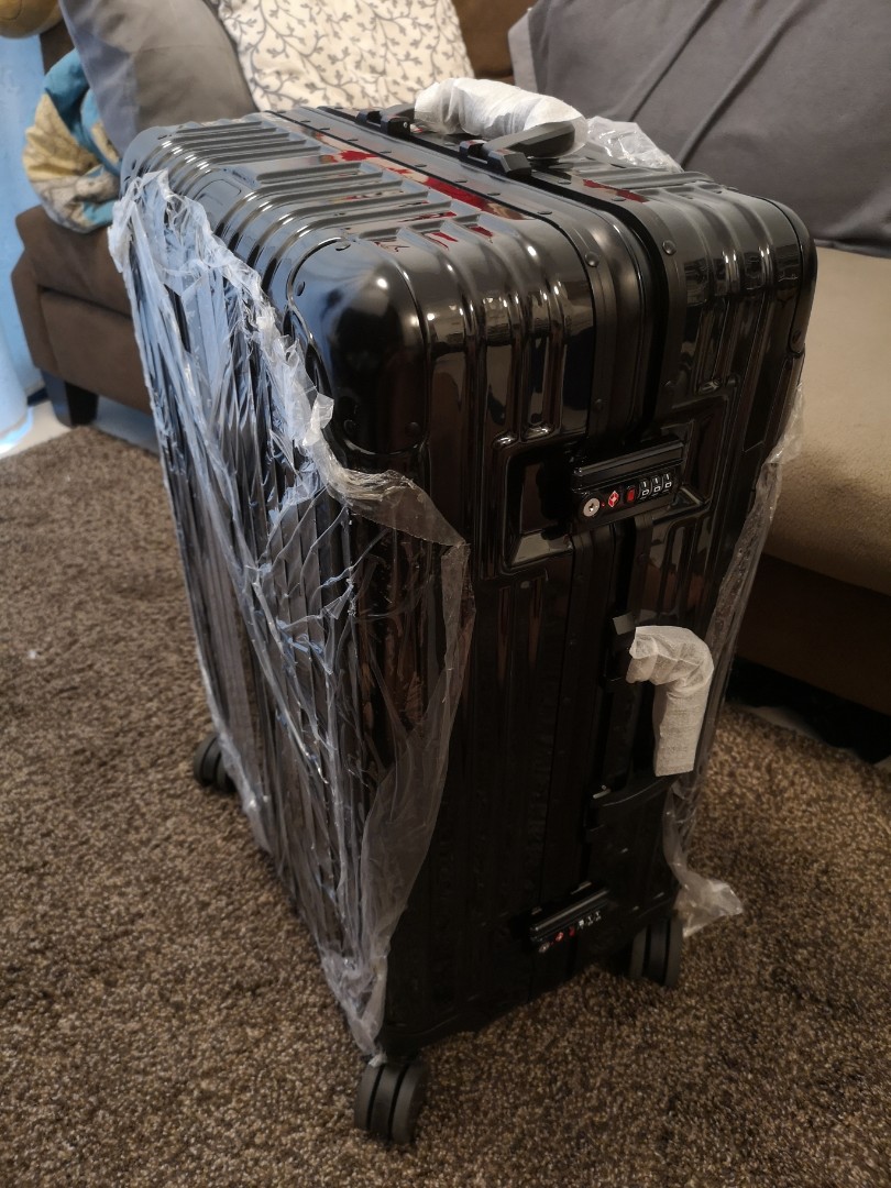 rimowa black luggage