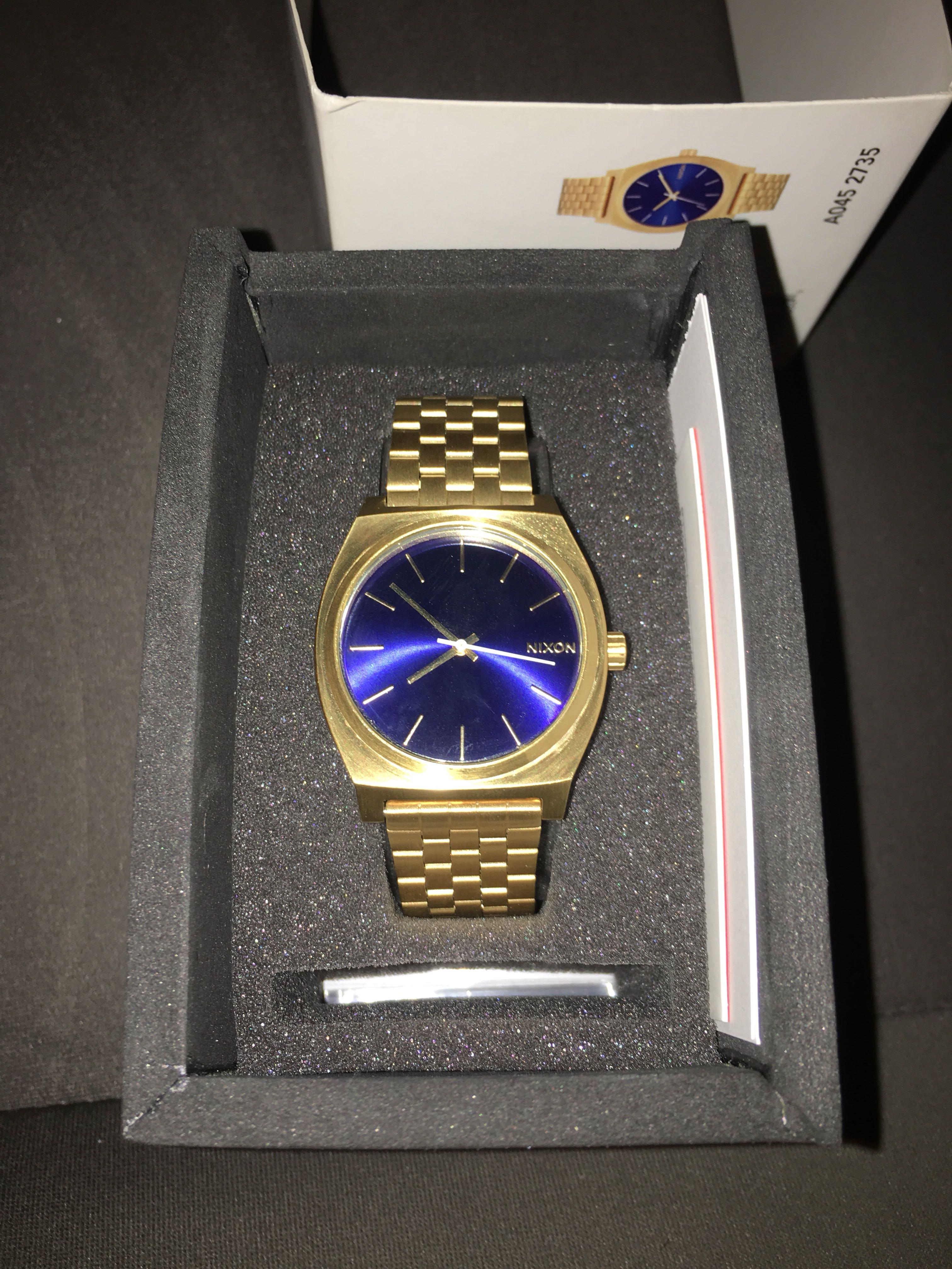 Nixon watches hot sale gold and blue