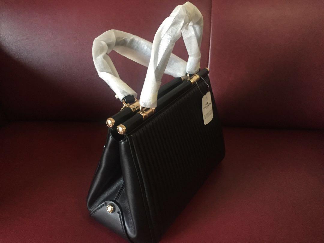 Grace bag with discount quilting and rivets