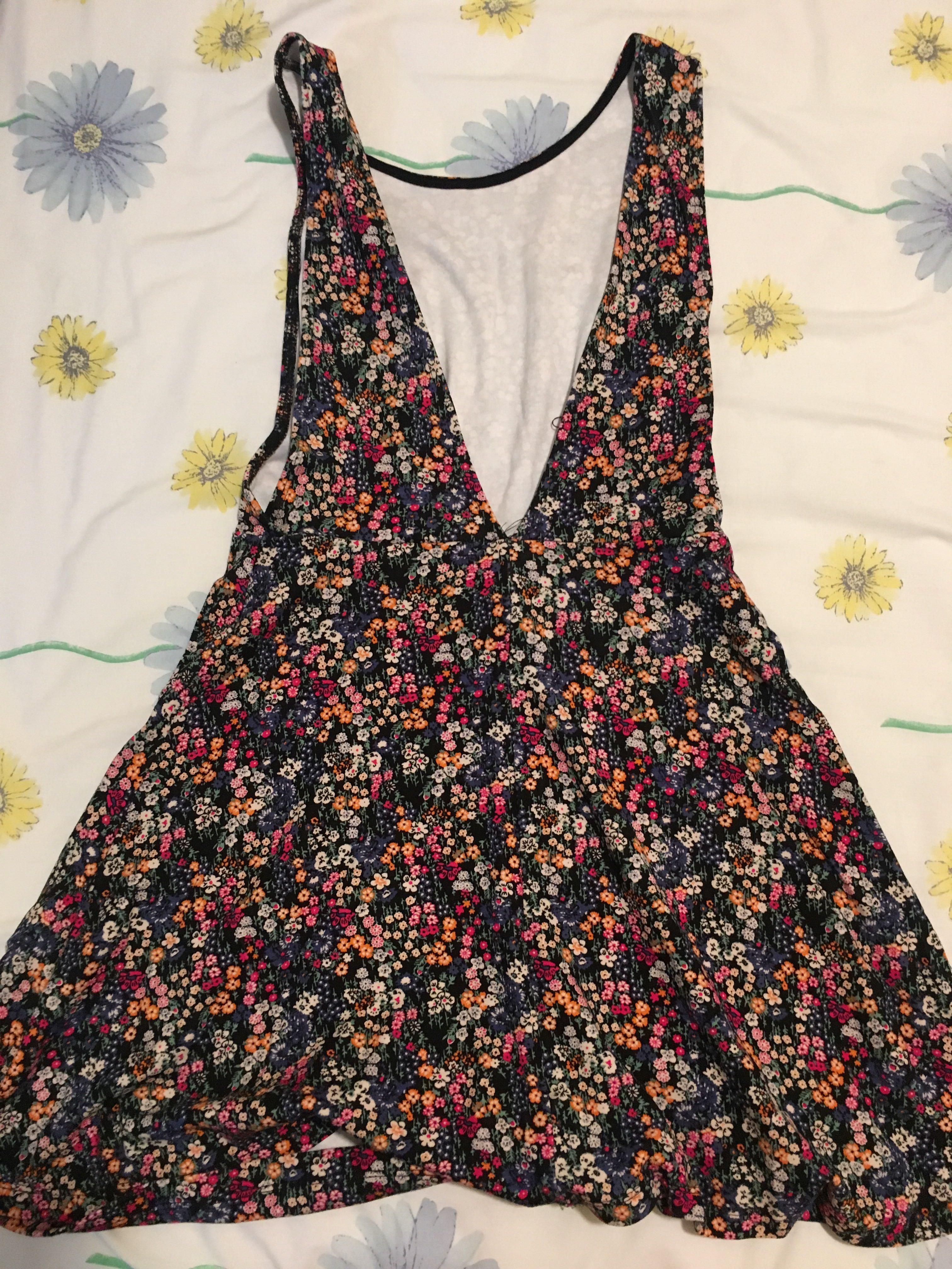Forever 21 Dress (Category: Dresses) located in Mandaluyong City. Submitted by melabells (Listing ID 206749653, Image 2). Description: Backless and deep v cut Tried on once Can wear with white shirt under the dress .