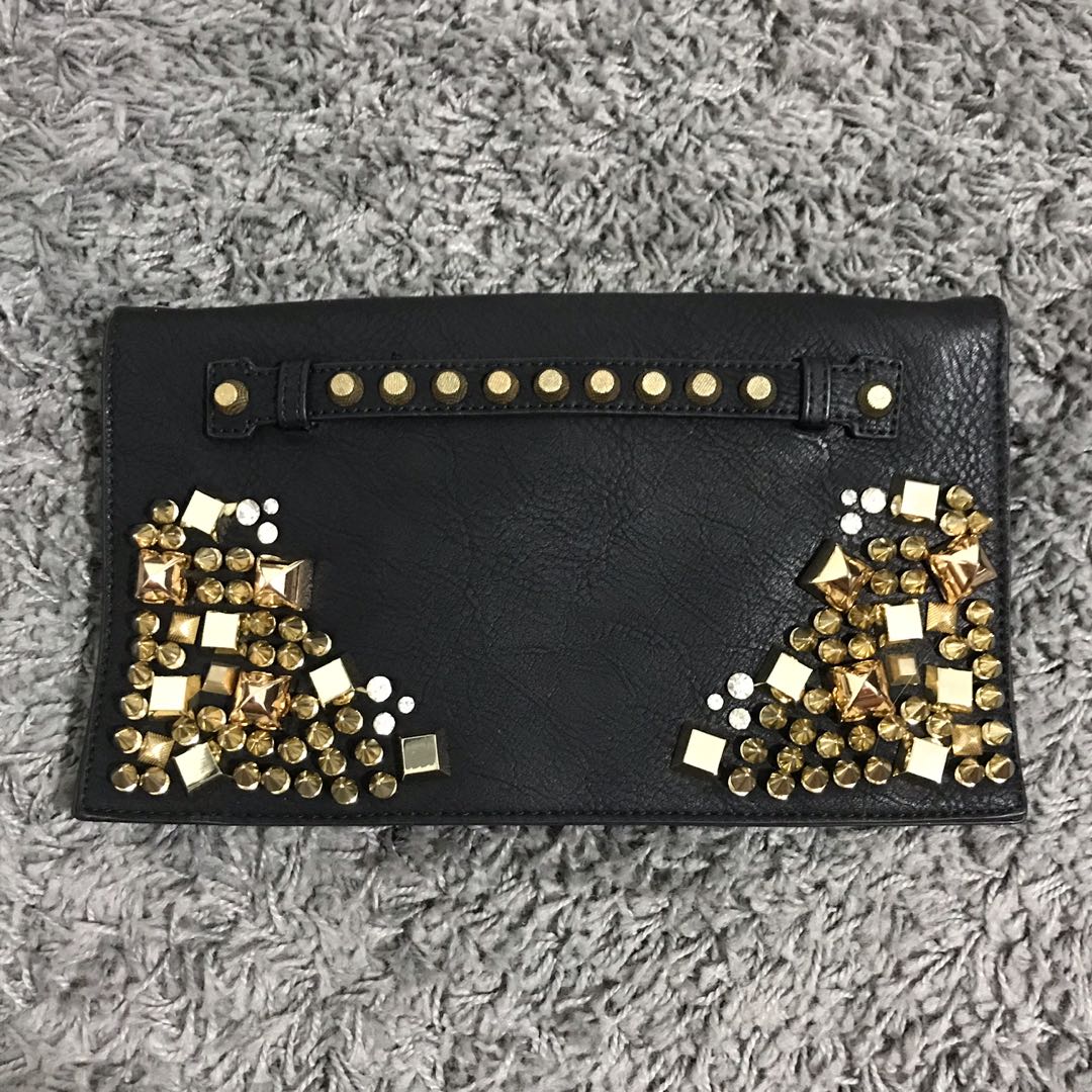 Gold studded clutch hotsell