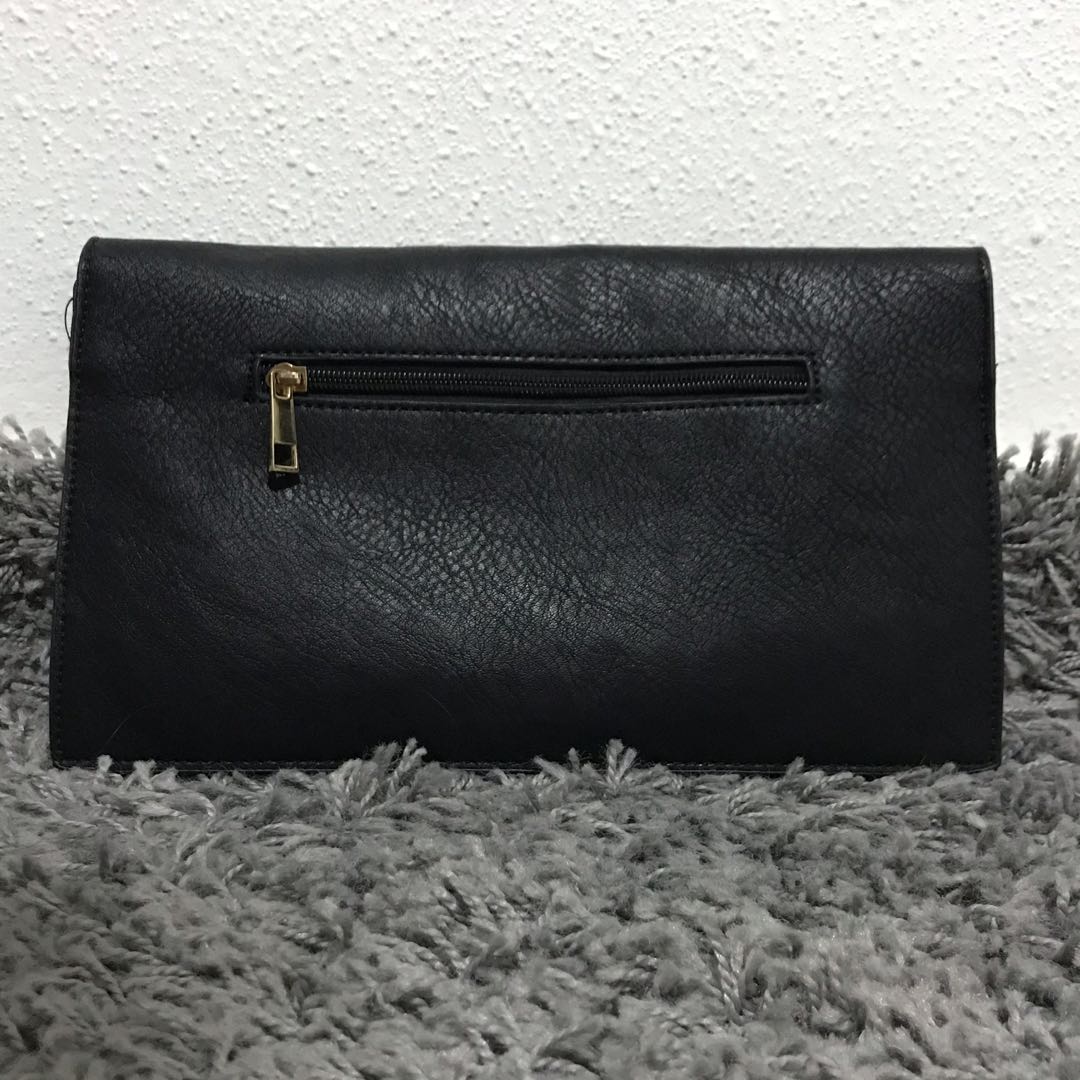 Gold studded clutch store
