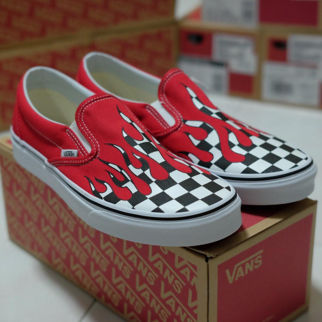 Red slip on vans checkered flames top
