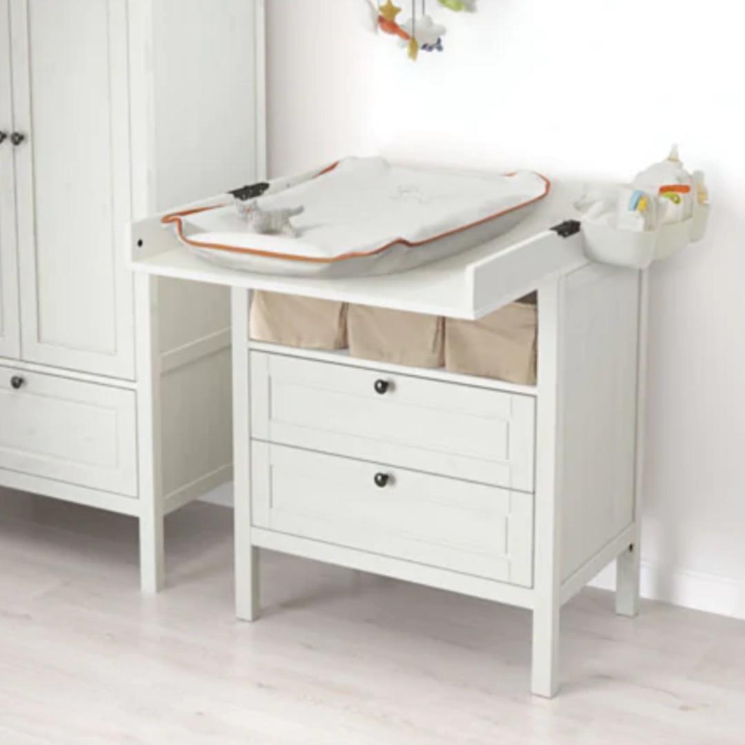 white wooden changing table