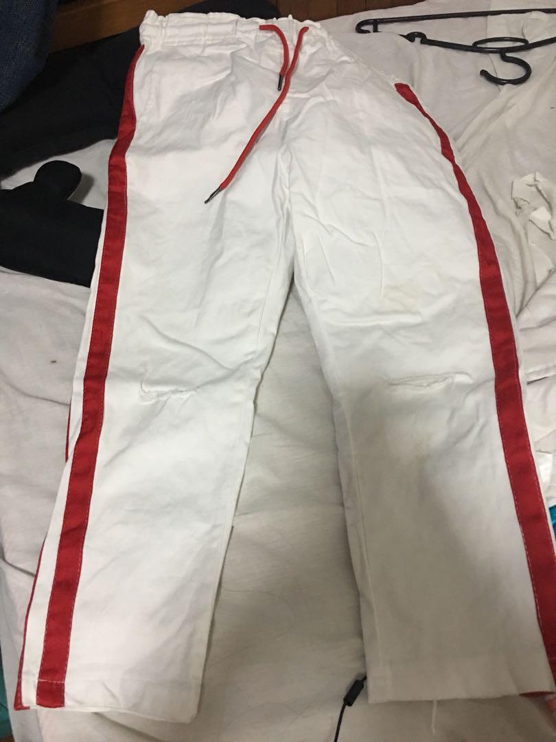White pants red top stripe