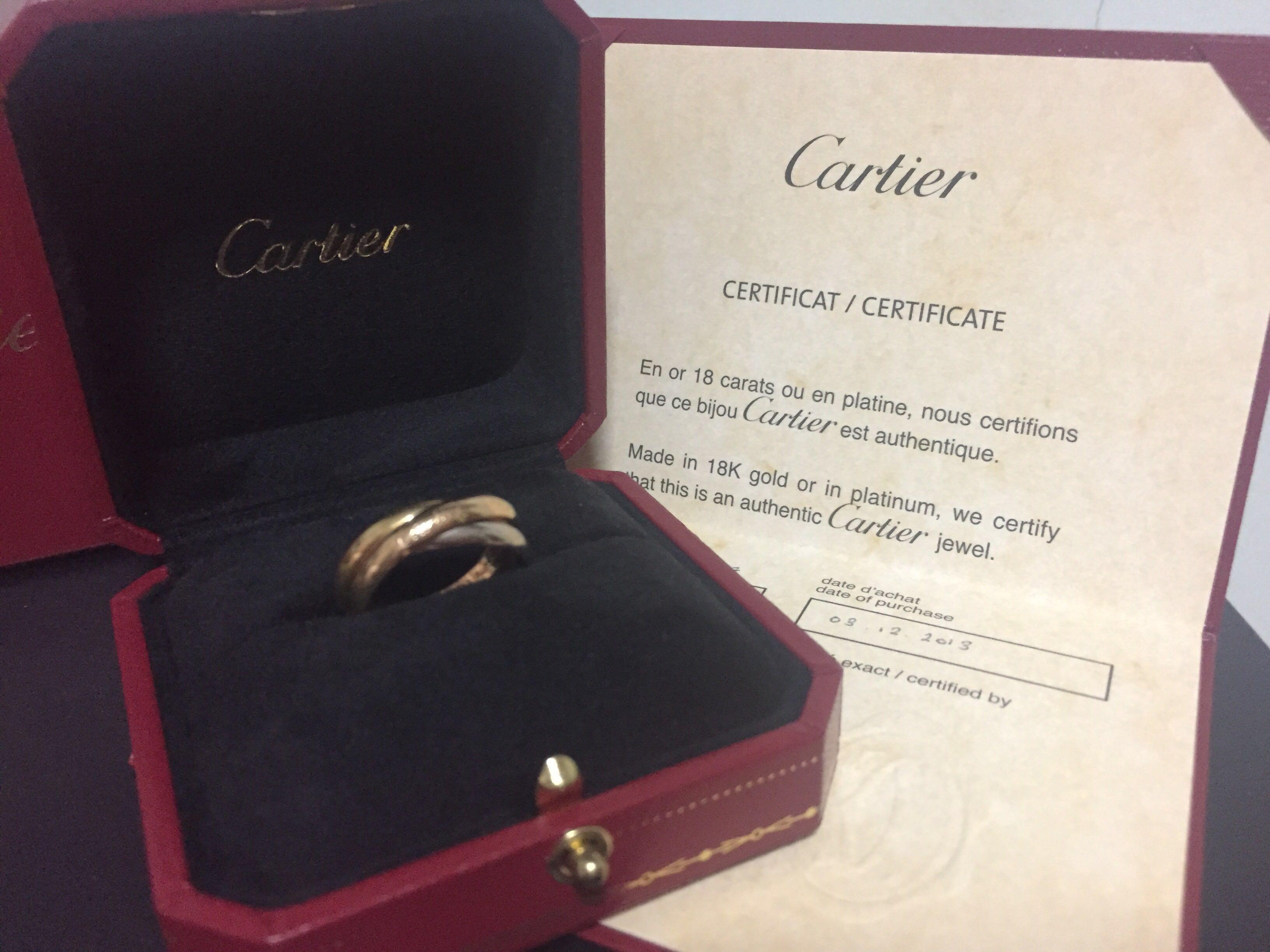 RESERVED - Cartier Trinity ring size 57 