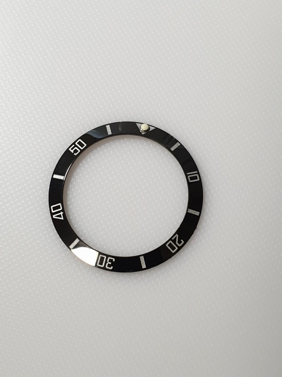 Sloped bezel clearance insert