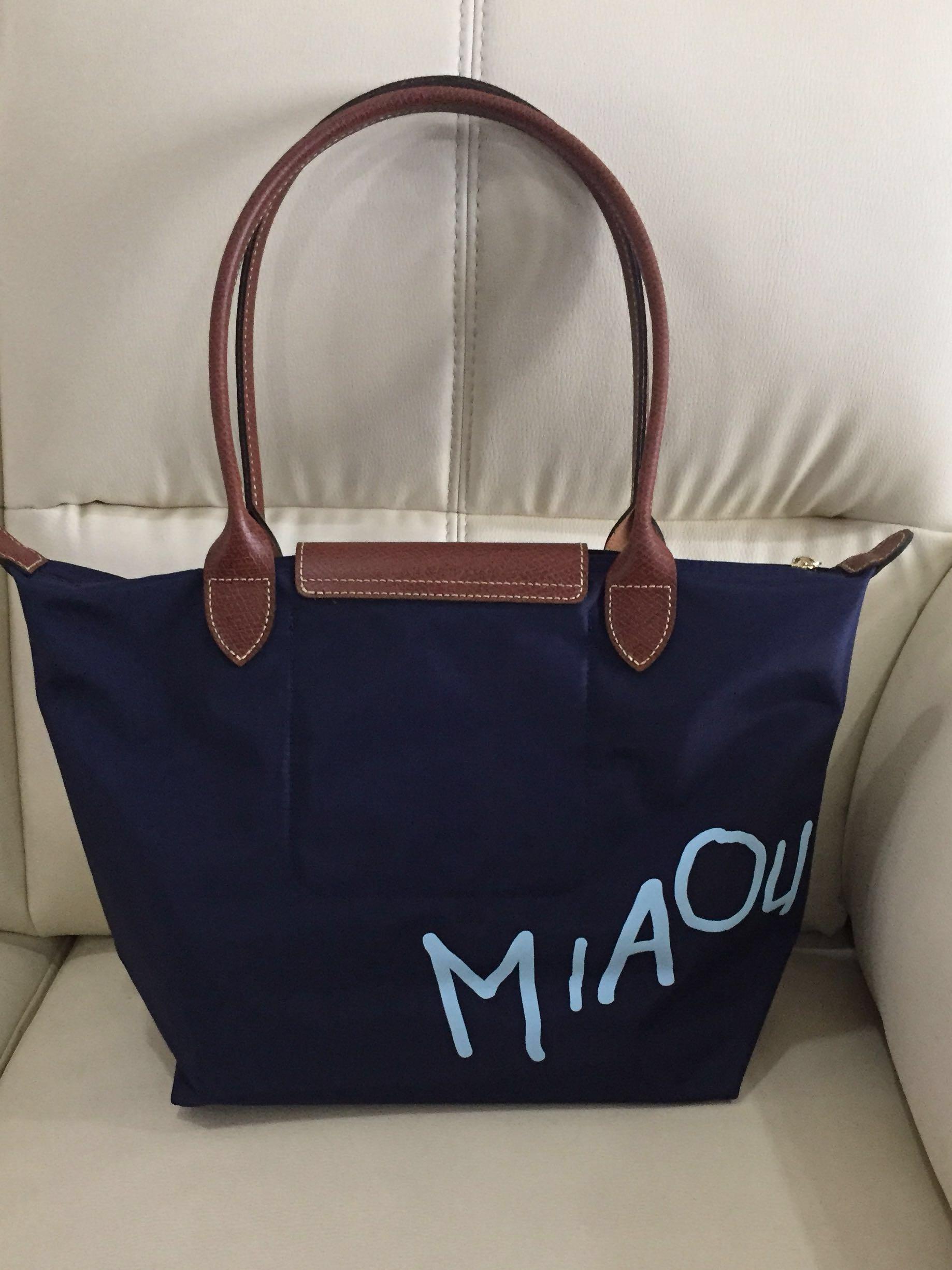 Longchamp cat eye bag shop