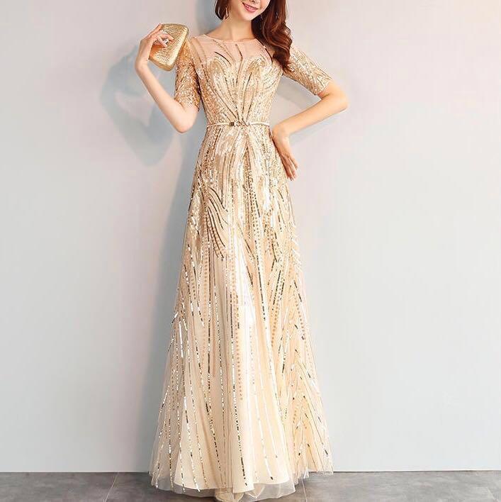 gold long sleeve ball gown