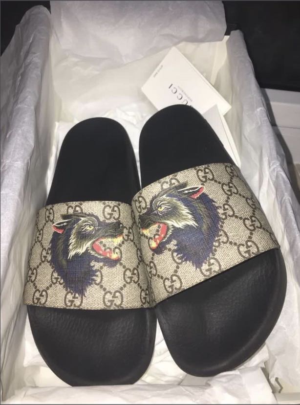 Gucci slides wolf discount