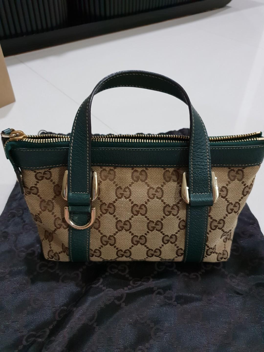Gucci small bag (Category: Tote Bags) located in Singapore. Submitted by sanimals (Listing ID 207515708, Image 2). Description: Condition 6/10.