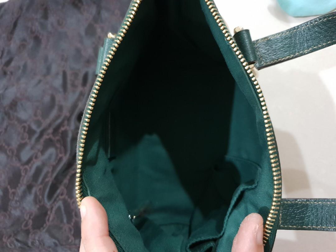 Gucci small bag (Category: Tote Bags) located in Singapore. Submitted by sanimals (Listing ID 207515708, Image 5). Description: Condition 6/10.